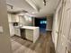 Modern kitchen with white cabinets and quartz counters at 795 Hammond Dr # 401, Atlanta, GA 30328