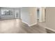 Spacious living room with hardwood floors and access to balcony at 795 Hammond Dr # 401, Atlanta, GA 30328