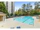 Resort-style pool with plenty of lounge chairs at 795 Hammond Dr # 401, Atlanta, GA 30328