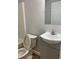 Bathroom featuring a toilet, sink, vanity, and a combined shower and tub at 2467 Shady Grove Rd, Carrollton, GA 30116