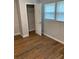 Bedroom featuring a closet and windows providing natural light at 2467 Shady Grove Rd, Carrollton, GA 30116