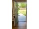 Inviting front door, with glass, offering a glimpse of the landscaped yard at 2467 Shady Grove Rd, Carrollton, GA 30116