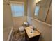 Updated bathroom with new vanity, toilet, and bathtub at 1877 Lomita Rd, Atlanta, GA 30316