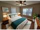 Main bedroom with hardwood floors, ceiling fan and stylish decor at 1877 Lomita Rd, Atlanta, GA 30316