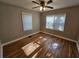 Hardwood floor bedroom with neutral walls and ceiling fan at 1877 Lomita Rd, Atlanta, GA 30316