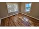 Bright bedroom with hardwood floors and large windows at 1877 Lomita Rd, Atlanta, GA 30316