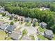 An aerial view showcasing a residential neighborhood with tree-lined streets and well-maintained homes at 243 Yorkshire Ln, Villa Rica, GA 30180