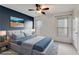 Comfortable bedroom with a plush bed, serene decor, and bright windows, creating a peaceful atmosphere at 243 Yorkshire Ln, Villa Rica, GA 30180