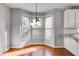 Cozy breakfast nook featuring bright bay windows and a modern chandelier at 243 Yorkshire Ln, Villa Rica, GA 30180