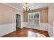 Dining room with hardwood flooring, natural light and neutral paint for easy personalization at 243 Yorkshire Ln, Villa Rica, GA 30180