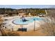 Community splash pool area with slides, sunshades, and landscaping near the pool at 243 Yorkshire Ln, Villa Rica, GA 30180