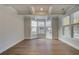 Spacious living room featuring hardwood floors and a bay window at 4045 Andover Cir, Mcdonough, GA 30252