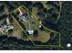 Overhead view of the entire acreage, highlighting the home, pool, guest house, and expansive yard at 289 Barn Rd, Canton, GA 30115