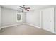 Inviting bedroom showcasing carpet, a window, and lots of natural light at 289 Barn Rd, Canton, GA 30115