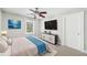 Comfortable bedroom with soft carpet, ceiling fan, and ample space for relaxation at 289 Barn Rd, Canton, GA 30115