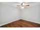 This bedroom offers hardwood floors and a ceiling fan at 289 Barn Rd, Canton, GA 30115