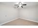 Cozy bedroom featuring neutral carpet and a ceiling fan at 289 Barn Rd, Canton, GA 30115