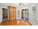 Breakfast area with wood floors, pantry and sliding glass doors to outdoor deck at 289 Barn Rd, Canton, GA 30115