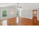Bright living room featuring hardwood floors, neutral paint, and vaulted ceilings at 289 Barn Rd, Canton, GA 30115