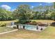 Fenced in backyard pool with mature landscaping, hardscaping, and privacy at 289 Barn Rd, Canton, GA 30115