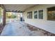 Spacious carport with concrete flooring and a covered structure, providing sheltered parking at 1526 N Cherokee N Rd, Social Circle, GA 30025