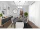Elegant dining room featuring modern decor, stylish lighting, and sophisticated accents at 7601 Watson Cir, Locust Grove, GA 30248
