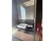Sleek bathroom vanity with a dark countertop, contemporary fixtures, and a large, modern mirror at 2719 Winding Ne Ln, Brookhaven, GA 30319