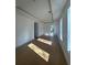 Spacious bedroom featuring natural light from large windows and tray ceiling at 2719 Winding Ne Ln, Brookhaven, GA 30319