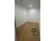 Cozy room with hardwood floors, ready to be transformed into your ideal space at 2719 Winding Ne Ln, Brookhaven, GA 30319