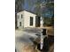 Modern two-story home featuring a concrete driveway and minimalist landscaping at 2719 Winding Ne Ln, Brookhaven, GA 30319