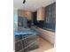 Modern kitchen with island and stainless steel appliances, contemporary design at 2719 Winding Ne Ln, Brookhaven, GA 30319