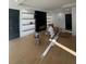 Bright living room with a modern fireplace and built-in shelving for storage and display at 2719 Winding Ne Ln, Brookhaven, GA 30319