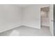 Spacious bedroom with grey carpet and access to an upper level at 3913 Brushy St, Powder Springs, GA 30127