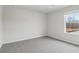 Spacious bedroom with grey carpet and a window with a view at 3913 Brushy St, Powder Springs, GA 30127
