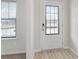 White front door with glass panes at 3913 Brushy St, Powder Springs, GA 30127
