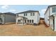 Two story home with covered patio and brick accents at 3913 Brushy St, Powder Springs, GA 30127
