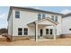 Two story home with covered patio and brick accents at 3913 Brushy St, Powder Springs, GA 30127