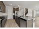 Modern kitchen with granite countertops and stainless steel appliances at 3913 Brushy St, Powder Springs, GA 30127