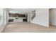 Open concept kitchen with island and dark brown cabinets at 3913 Brushy St, Powder Springs, GA 30127