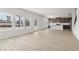 Open concept kitchen with island and dark brown cabinets at 3913 Brushy St, Powder Springs, GA 30127