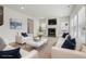 Spacious living room with fireplace and ample natural light at 3913 Brushy St, Powder Springs, GA 30127