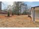 Landscaped backyard with new sod and young trees at 3933 Brushy St, Powder Springs, GA 30127