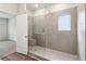 Bathroom with a large walk-in shower and a tiled floor at 3933 Brushy St, Powder Springs, GA 30127