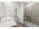 Modern bathroom with double vanity and walk-in shower at 3933 Brushy St, Powder Springs, GA 30127