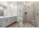 Spa-like bathroom featuring a double vanity and a large walk-in shower at 3933 Brushy St, Powder Springs, GA 30127