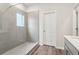 Modern bathroom with walk-in shower and double vanity at 3933 Brushy St, Powder Springs, GA 30127