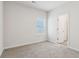 Simple bedroom with carpet flooring and a window at 3933 Brushy St, Powder Springs, GA 30127