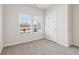 Spacious bedroom with carpet flooring and backyard view at 3933 Brushy St, Powder Springs, GA 30127