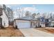 Craftsman style home with gray siding and white brick accents at 3933 Brushy St, Powder Springs, GA 30127