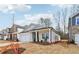 Charming craftsman style home with a two-car garage at 3933 Brushy St, Powder Springs, GA 30127